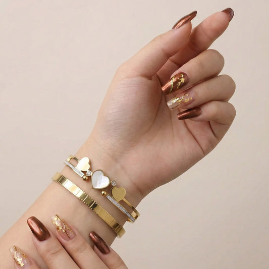 Heart & Harmony Bracelet Stack - 18K gold plated stainless steel bracelet stack close-up view - Mehraya