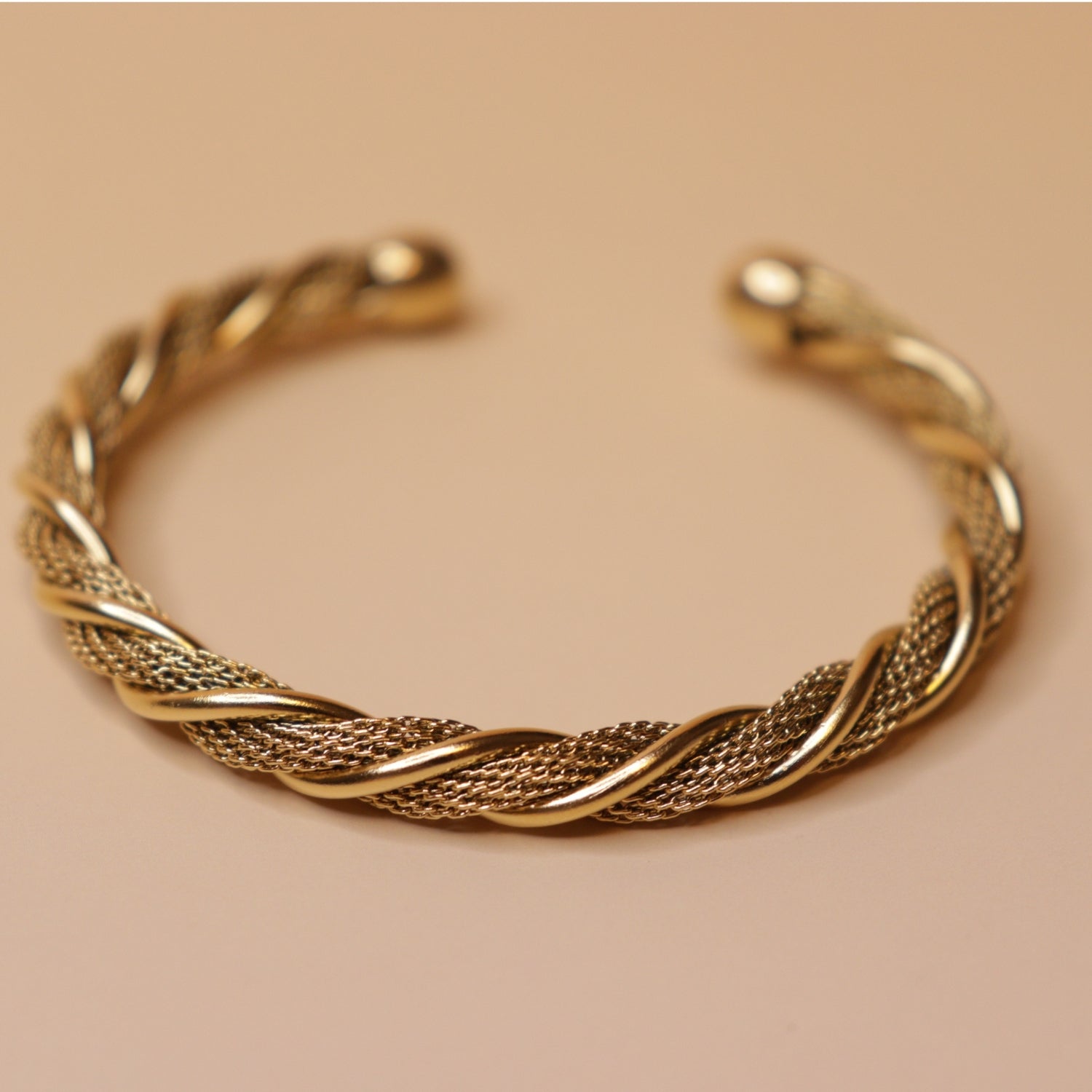 Twisted Elegance Bracelet Stack - 18K gold plated stainless steel bracelet stack close-up view - Mehraya