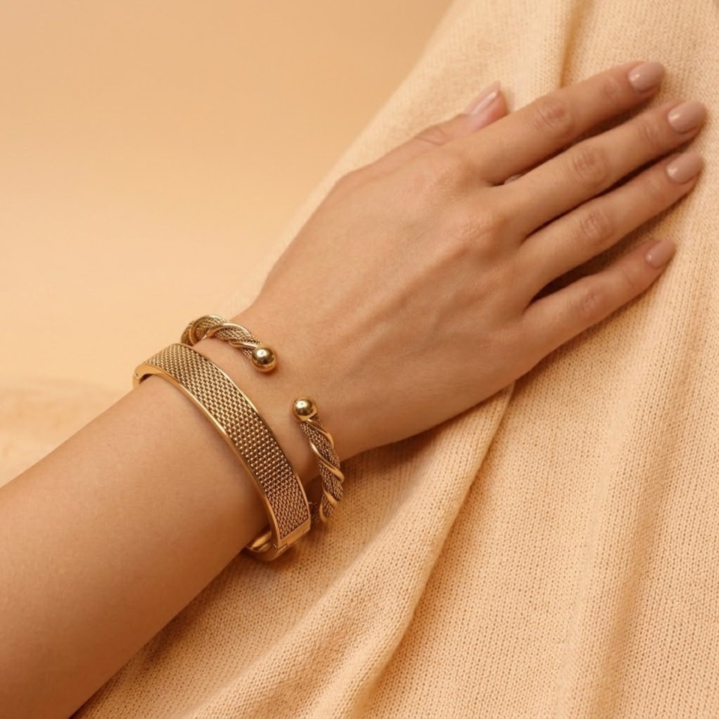 Twisted Elegance Bracelet Stack - 18K gold plated stainless steel bracelet stack close-up view - Mehraya