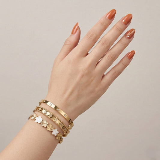 Charm Trio Bracelet Stack - 18K gold plated stainless steel bracelet stack close-up view - Mehraya