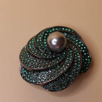 Emerald Whirl Brooch
