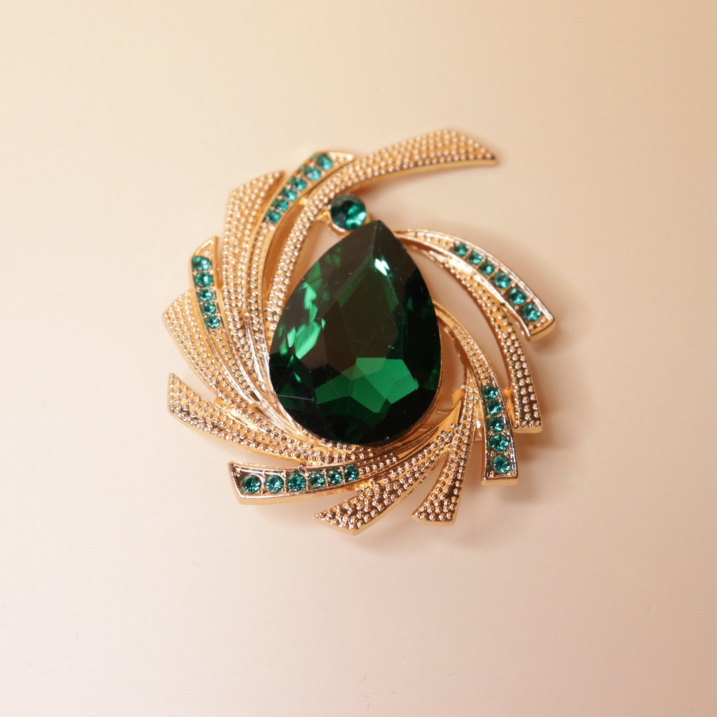 Radiant Emerald Swirl Brooch